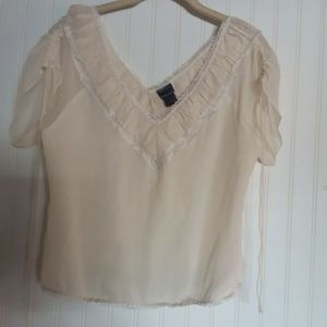 Delicate top by PAZO.  Creamy dreamy color. Size 12.